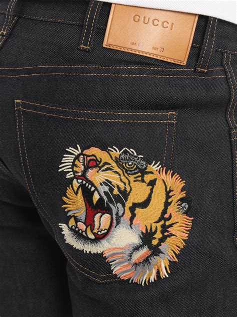 jeans gucci uomo tigre anni 90|Denim Uomo .